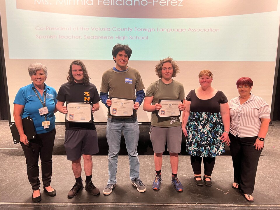 Local partners provide money for student scholarships each year. This year, scholarships were presented to 7 students (L-R): Dr. Grace Kellermeier, Gabriel Isaacson, Isaias Salmeron, Zachary Schrager, Ms. Kim Griffith and Ms. Mirthia Feliciano-Perez, co-presidents of the VCFLA (which is why Seabreeze hosts the festival).